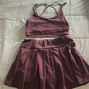Burgundy athletic set tank top and skirt with built-in shorts
